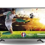 A person watching IPTV UK on a smart TV using XTEAM IPTV service.